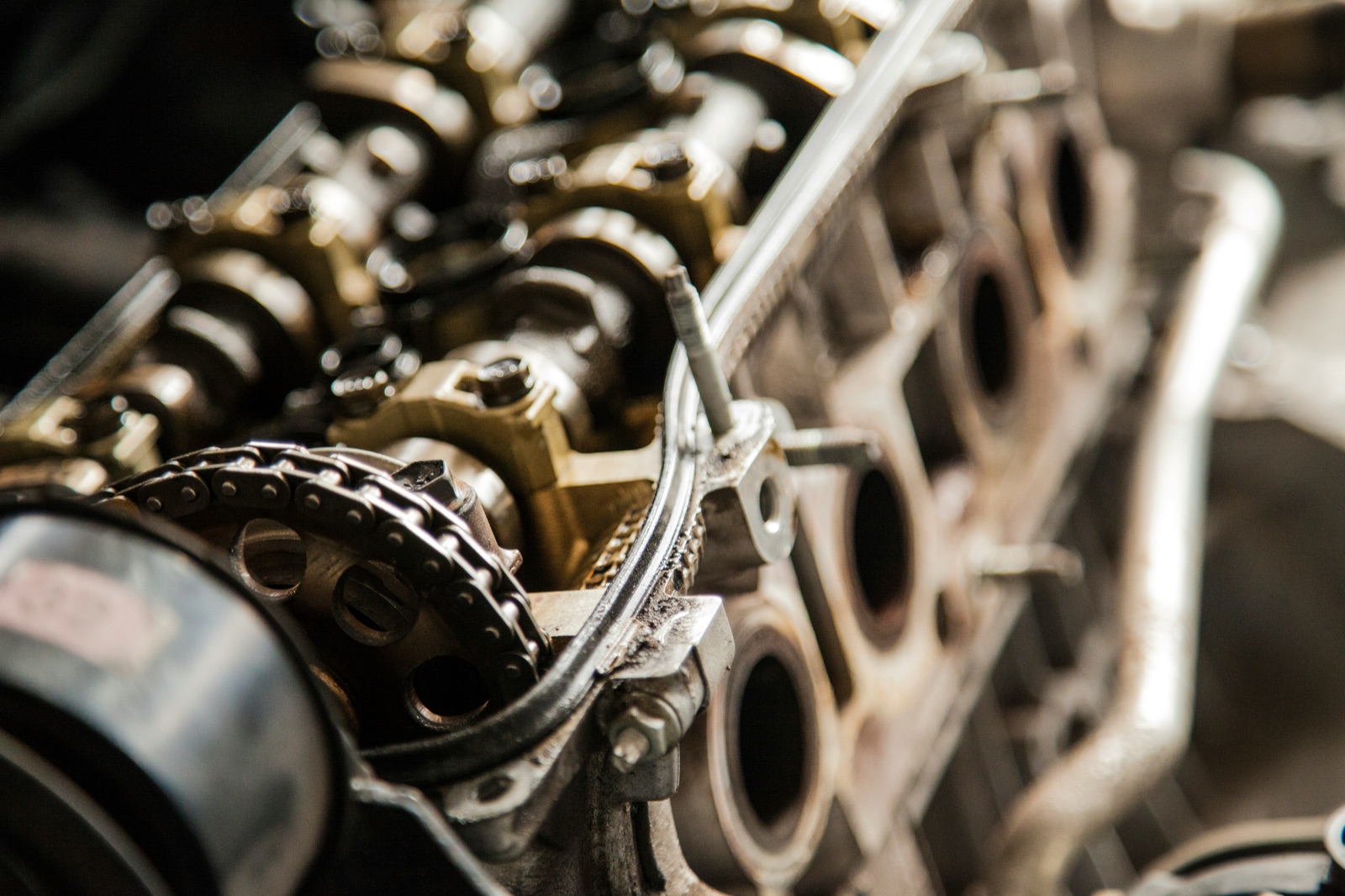 Gray car engine bay with metal components for Epo-Weld™ TC thermally conductive epoxy automotive electronics assembly