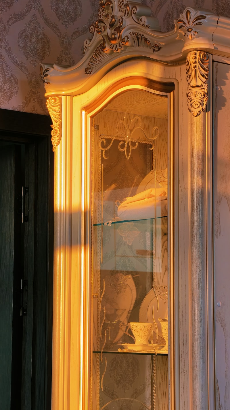 Glass cabinet doors with ornate display shelving for Uni-Weld™ UV glass furniture bonding